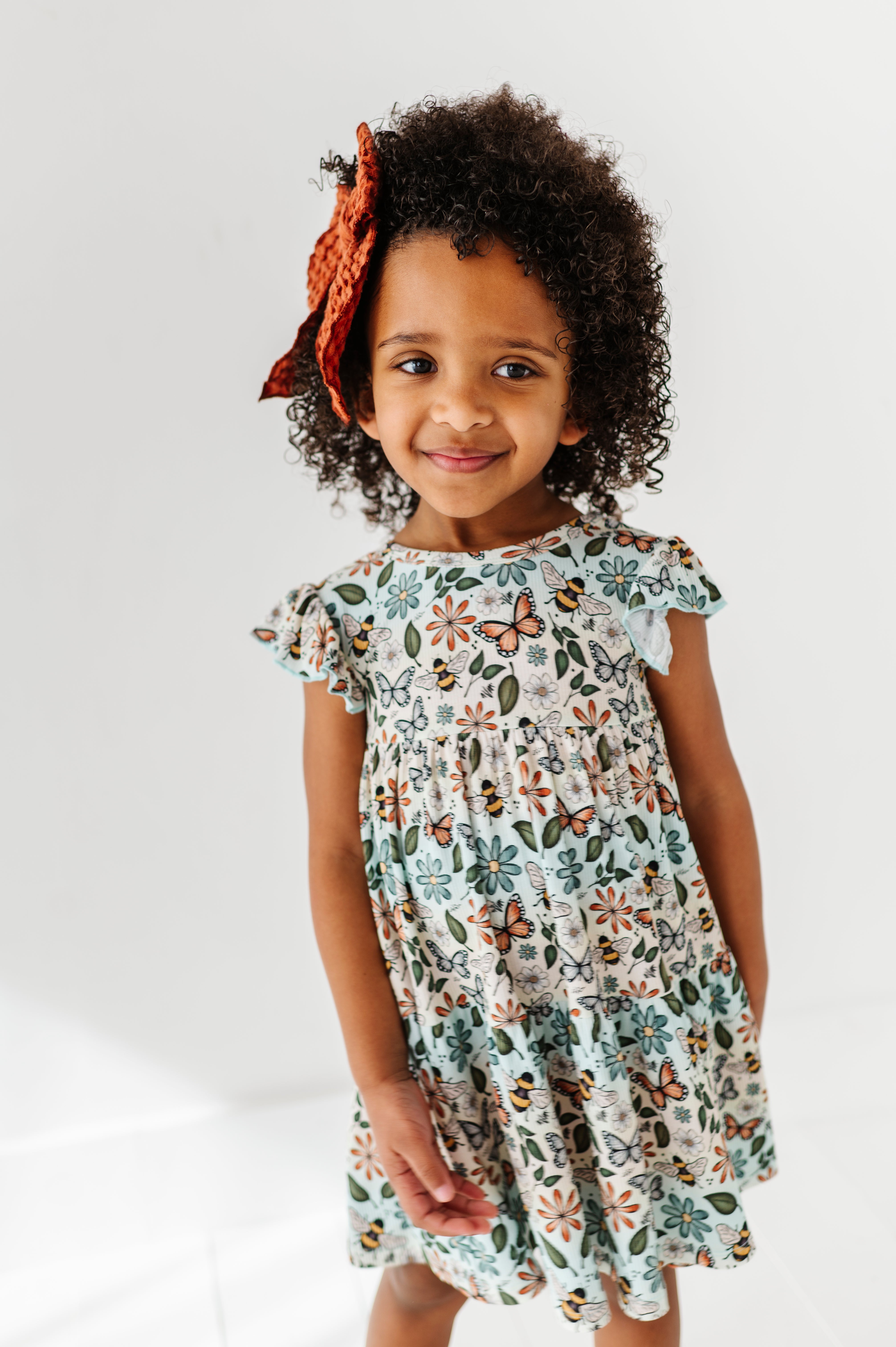 RIBBED TIERED FLUTTER SLEEVE TWIRL WITH SHORTS - BUZZING BLOSSOMS