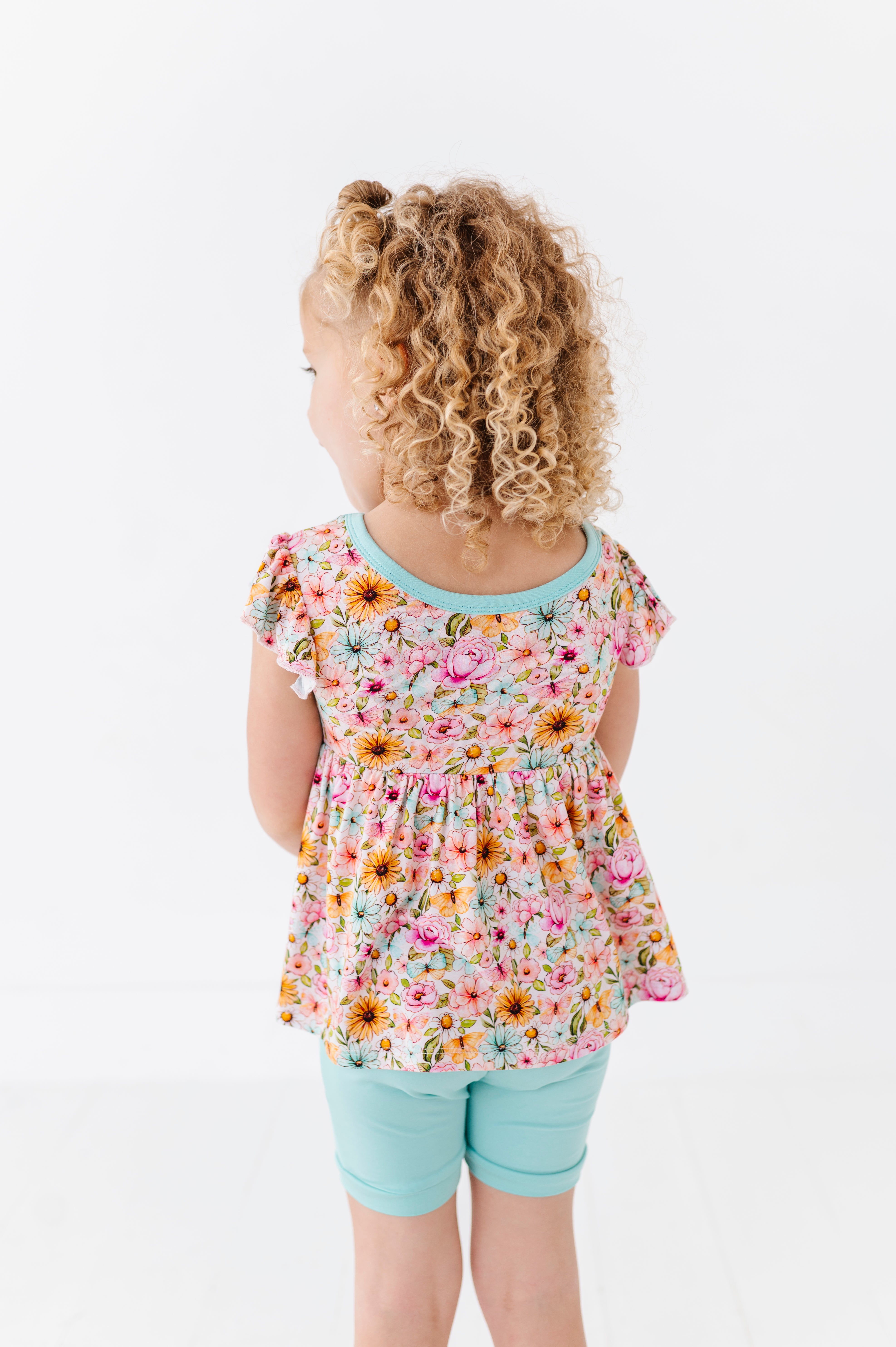 FLUTTER PEPLUM WITH SHORTS - PENELOPE’S PETALS