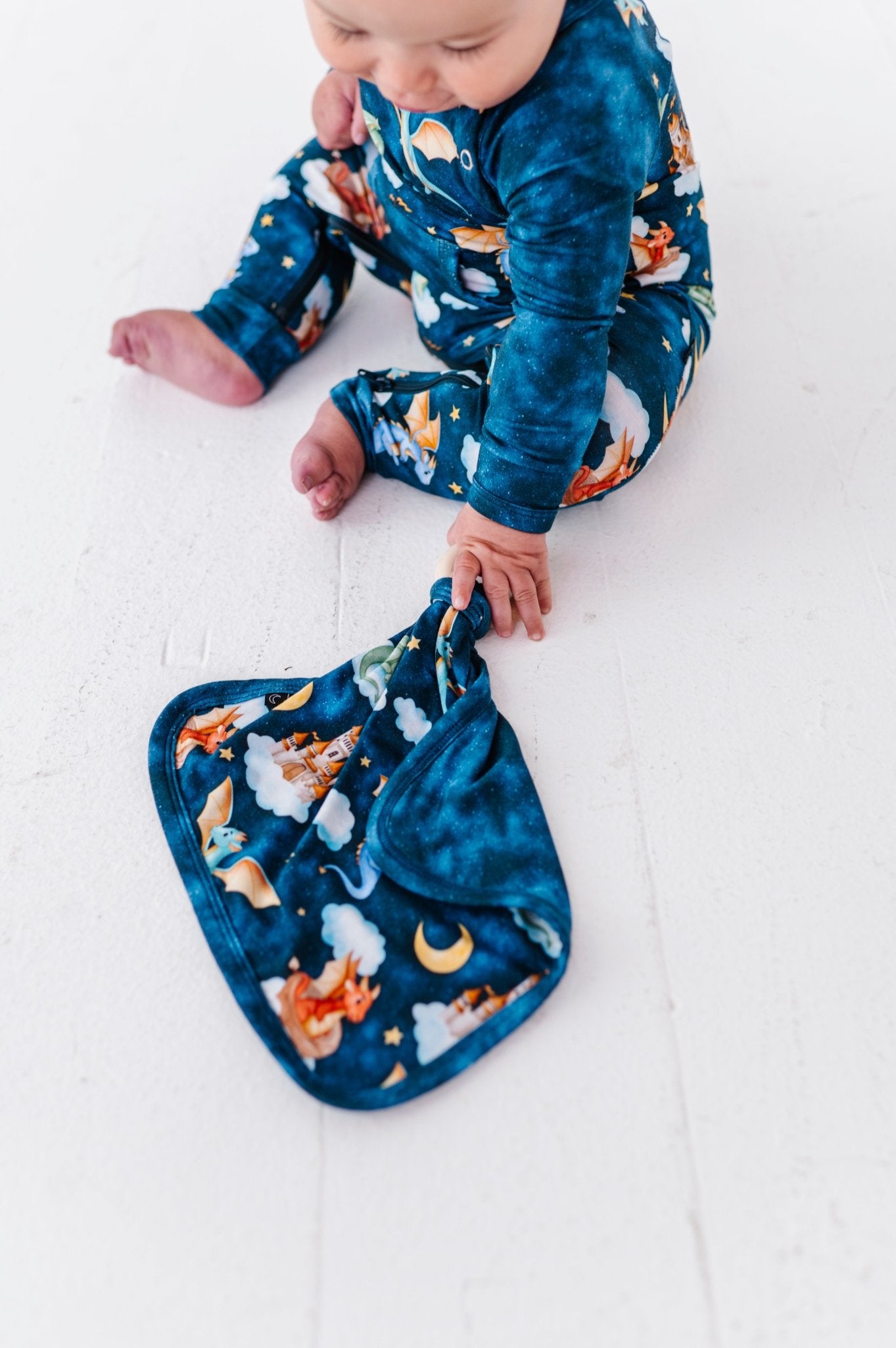 MINI LOVIE WITH WOODEN RING - PRISMA - The Sleepy Sloth