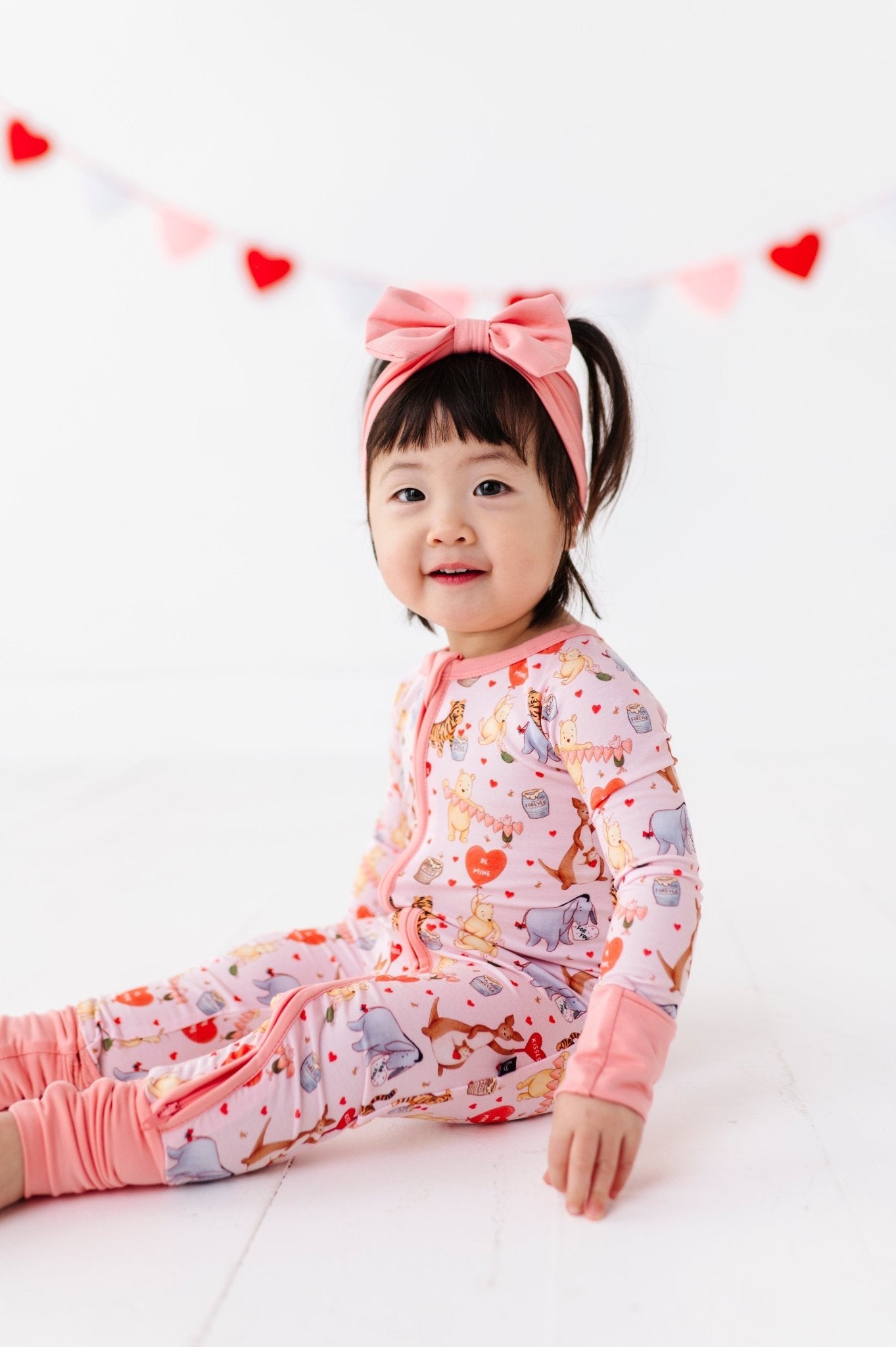 PREORDER ADAPTIVE ZIP JAMMIES - 100 ACRES OF KISSES PREORDER - The Sleepy Sloth