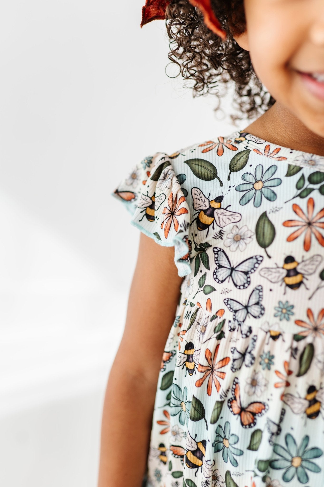 RIBBED TIERED FLUTTER SLEEVE TWIRL WITH SHORTS - BUZZING BLOSSOMS - The Sleepy Sloth