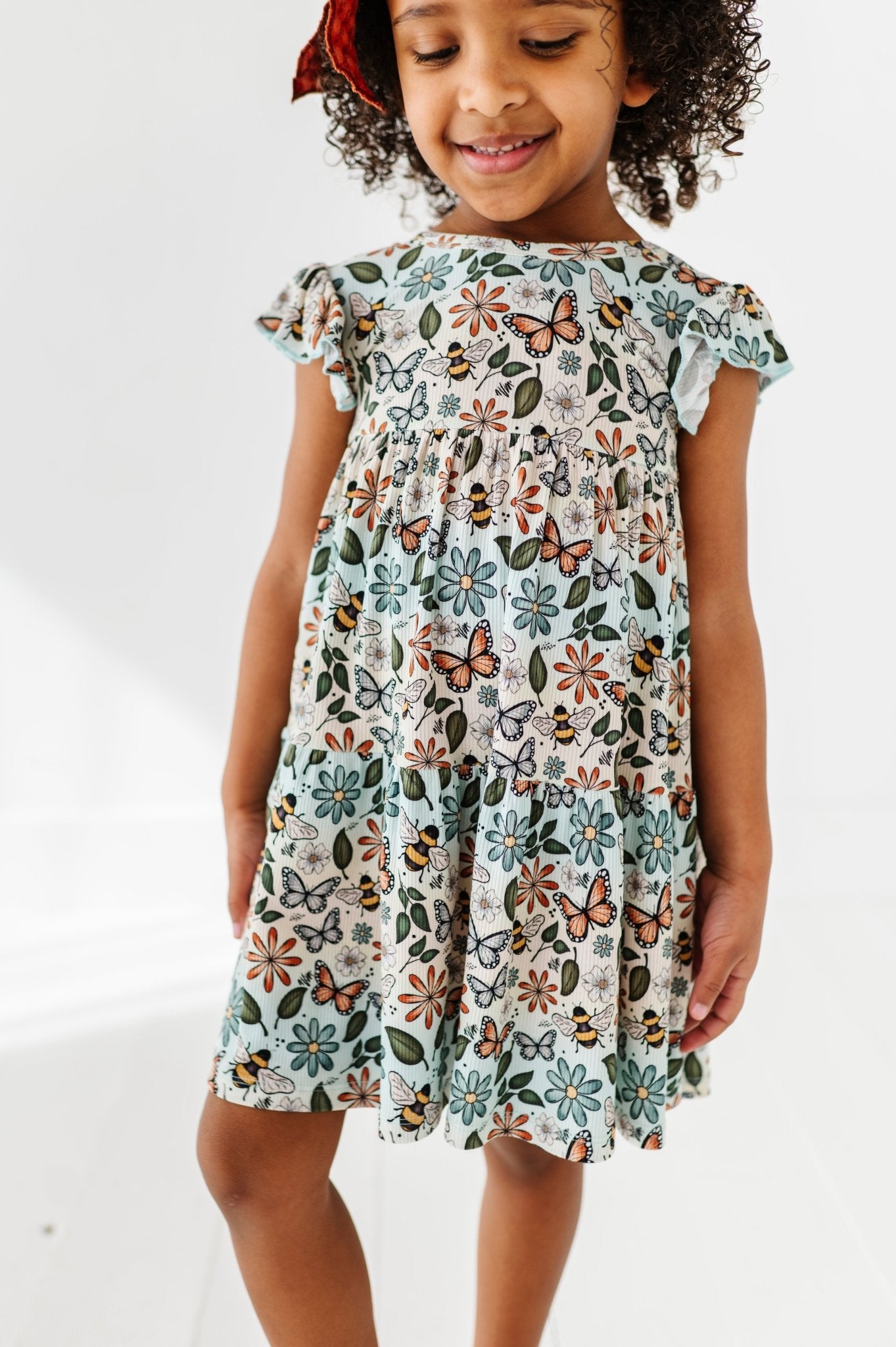 RIBBED TIERED FLUTTER SLEEVE TWIRL WITH SHORTS - BUZZING BLOSSOMS - The Sleepy Sloth
