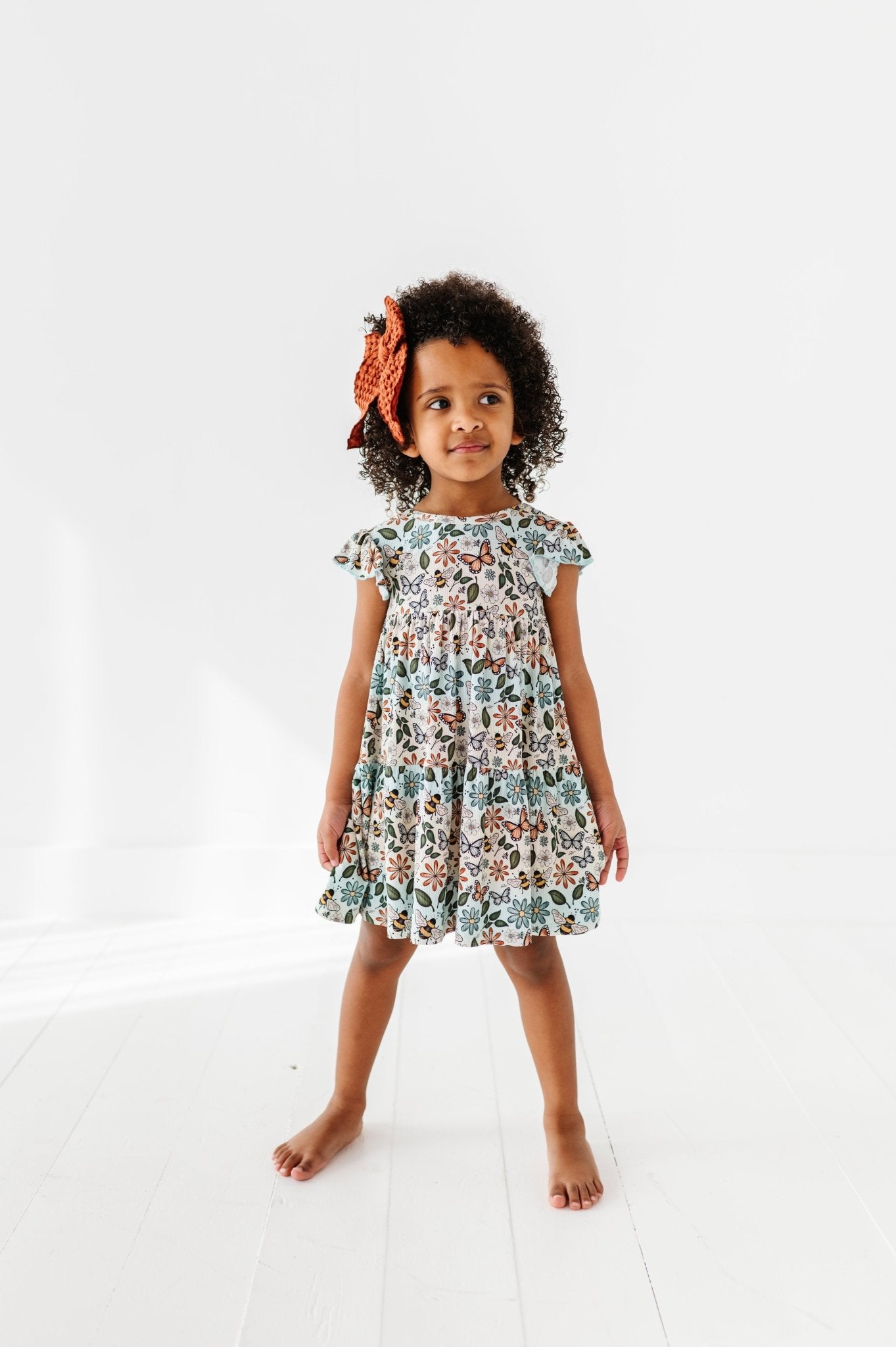 RIBBED TIERED FLUTTER SLEEVE TWIRL WITH SHORTS - BUZZING BLOSSOMS - The Sleepy Sloth