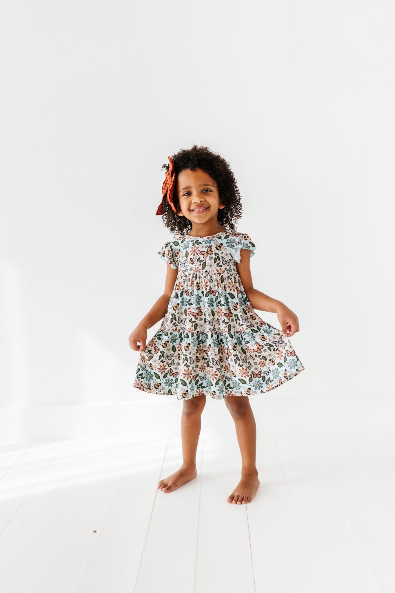 RIBBED TIERED FLUTTER SLEEVE TWIRL WITH SHORTS - BUZZING BLOSSOMS - The Sleepy Sloth