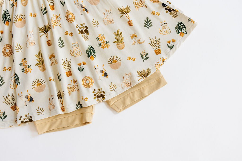 TIERED FLUTTER SLEEVE TWIRL DRESS WITH SHORTS - WHISKERS & WALLFLOWERS - The Sleepy Sloth