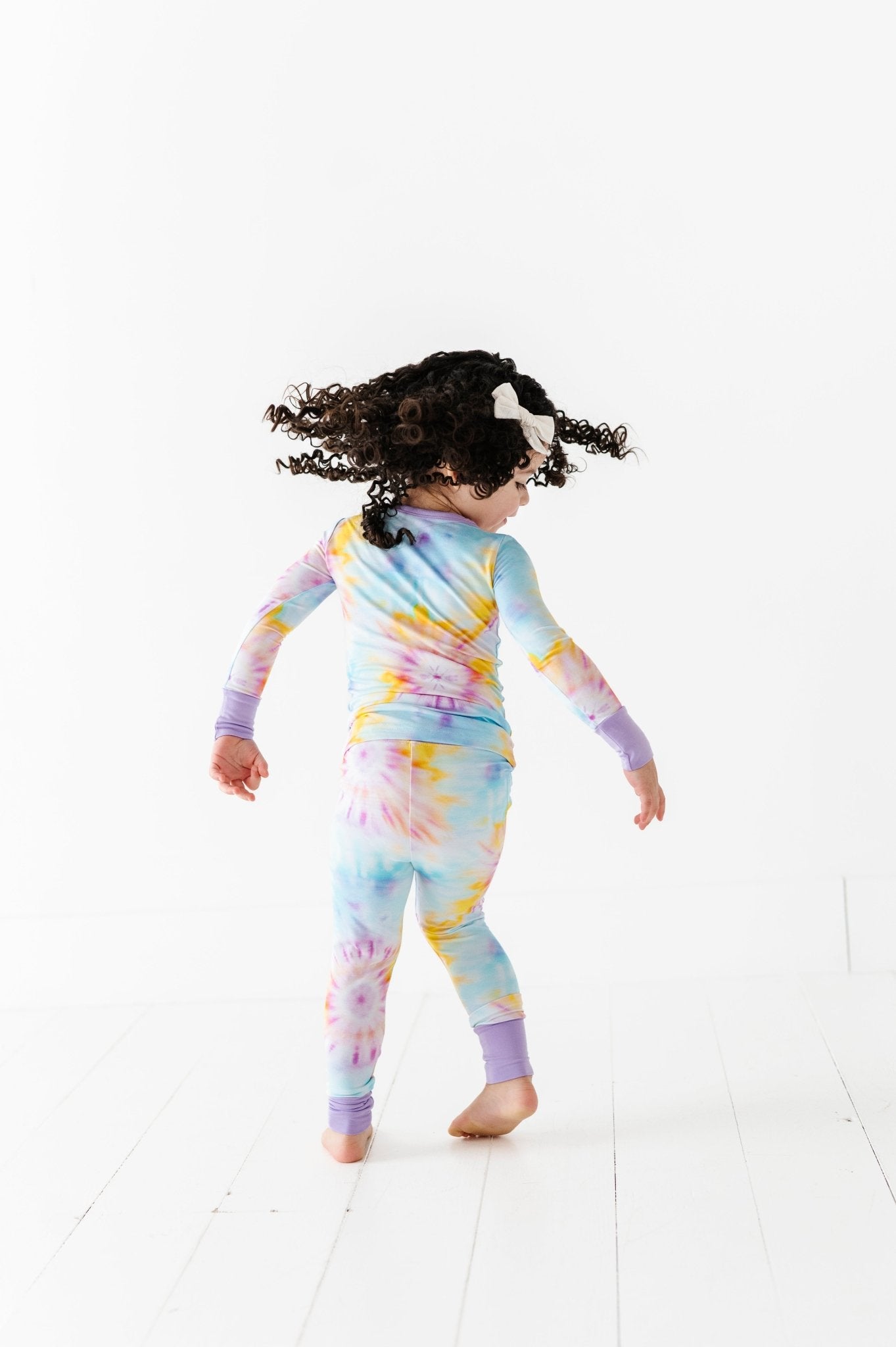 TWO PIECE JAMMIES - RAINBOW TWIST - The Sleepy Sloth