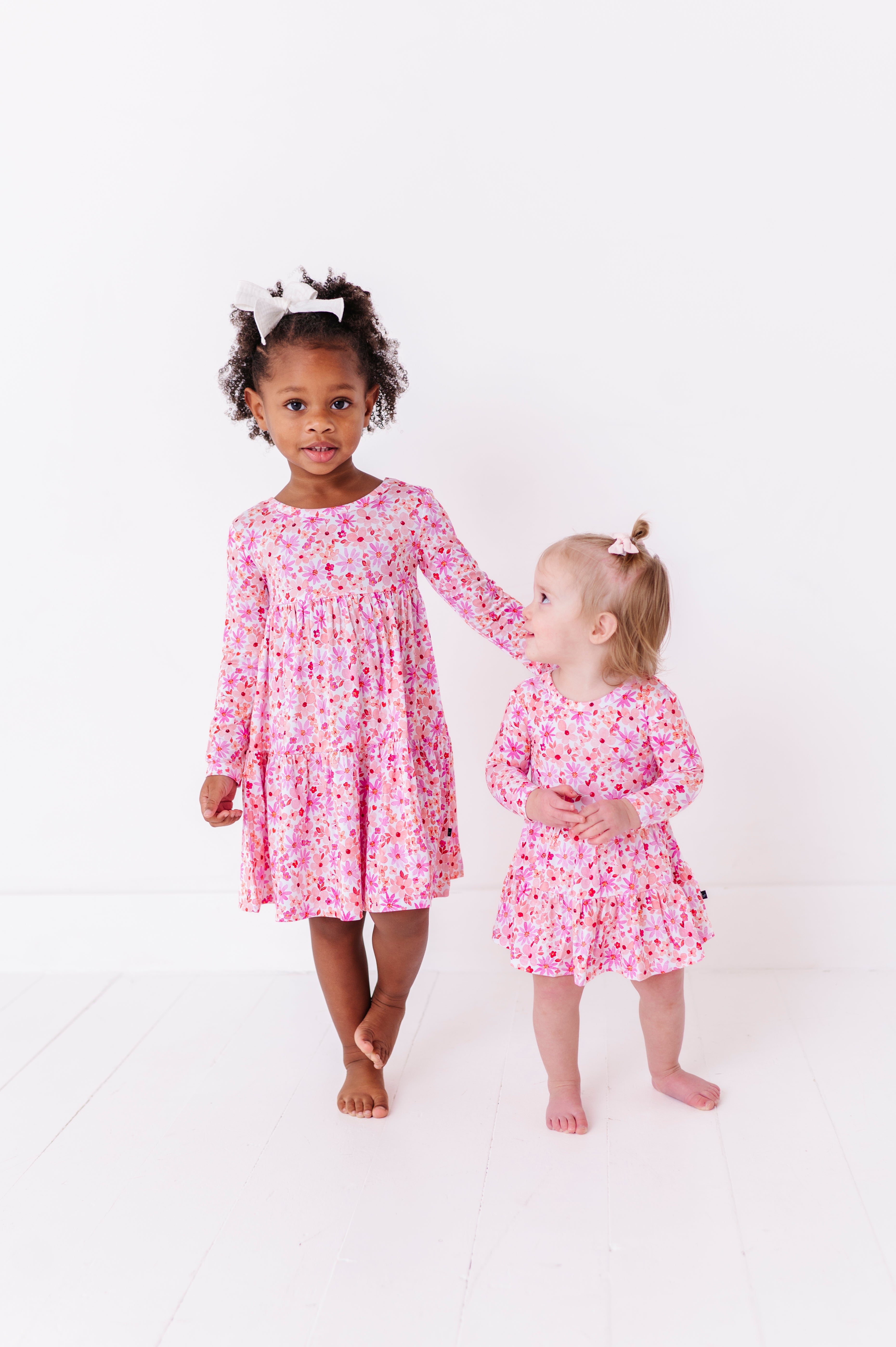 TIERED LONG SLEEVE TWIRL DRESS - BLUSHING BLOOMS