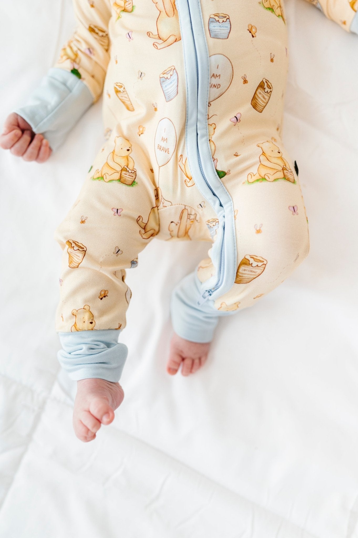 ADAPTIVE ZIP JAMMIES - 100 ACRES OF KINDNESS *PRE ORDER* - The Sleepy Sloth