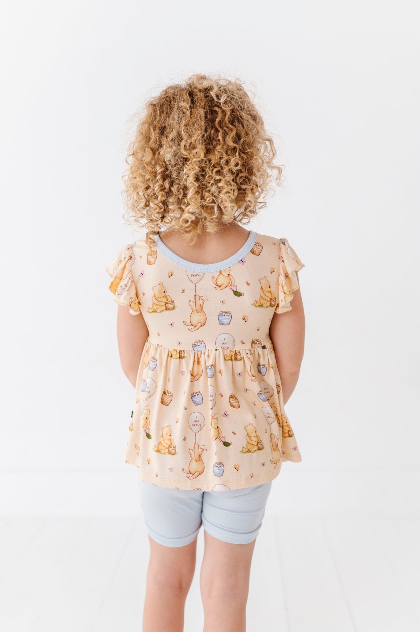 FLUTTER PEPLUM WITH SHORTS - 100 ACRES OF KINDNESS - The Sleepy Sloth