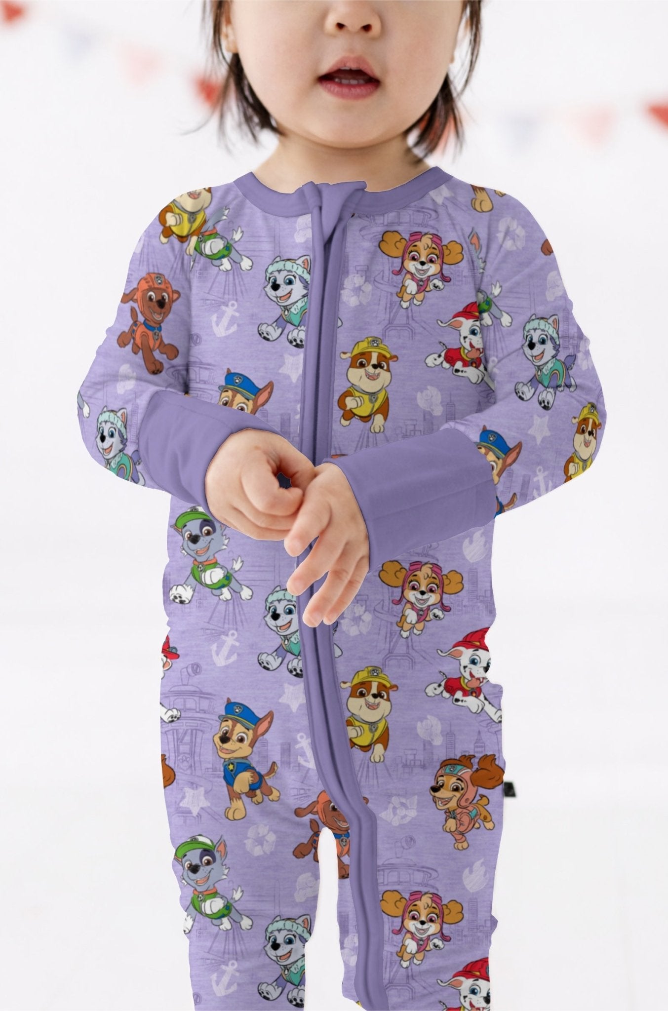 PREORDER ZIP JAMMIES - PAW PATROL™ ON A ROLL! (LILAC) - The Sleepy Sloth
