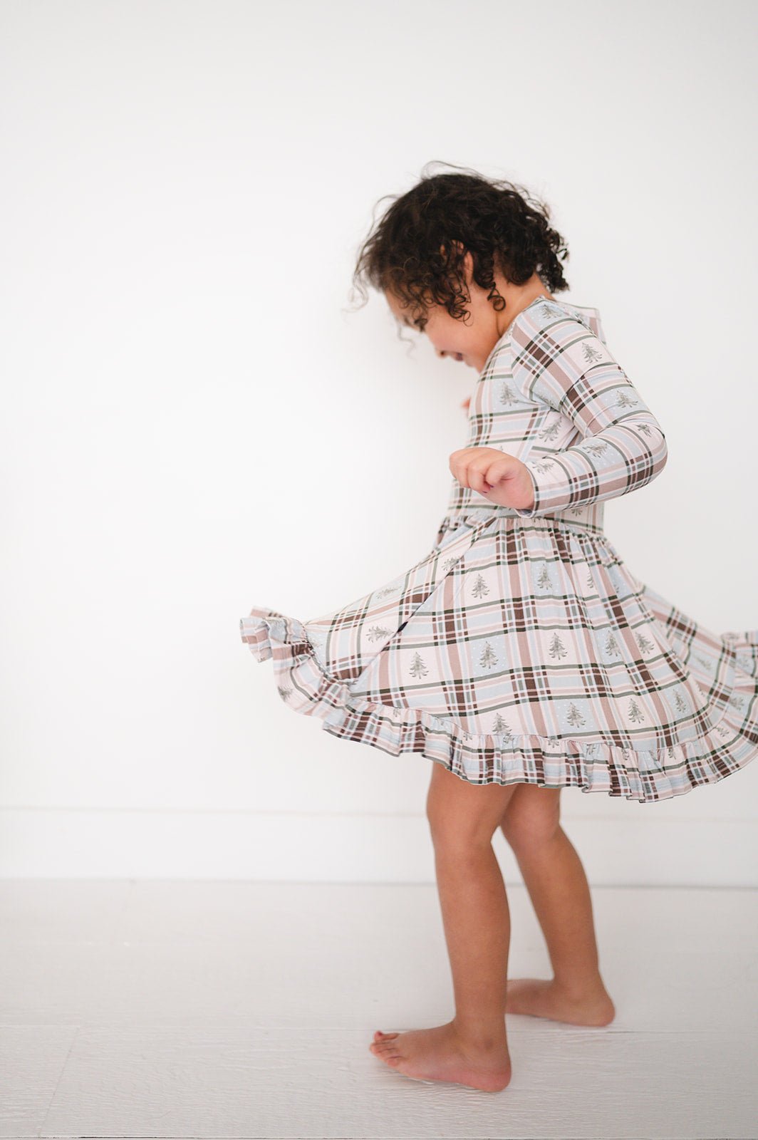 RUFFLE TWIRL DRESS - HOLIDAY PLAID - The Sleepy Sloth