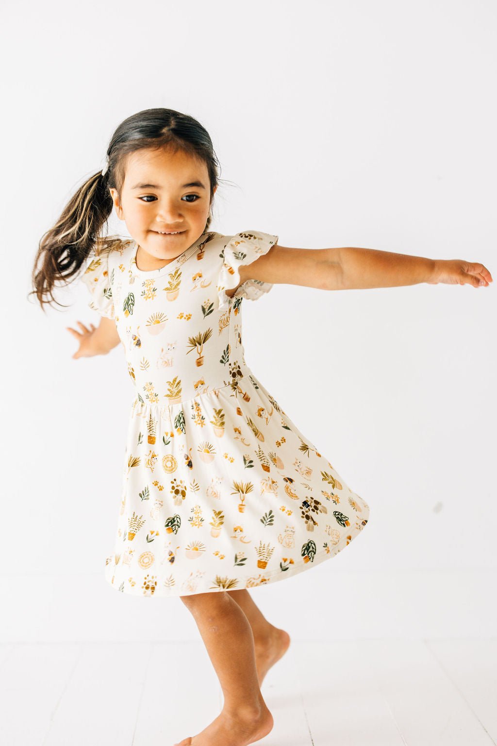 TIERED FLUTTER SLEEVE TWIRL DRESS WITH SHORTS - WHISKERS & WALLFLOWERS - The Sleepy Sloth