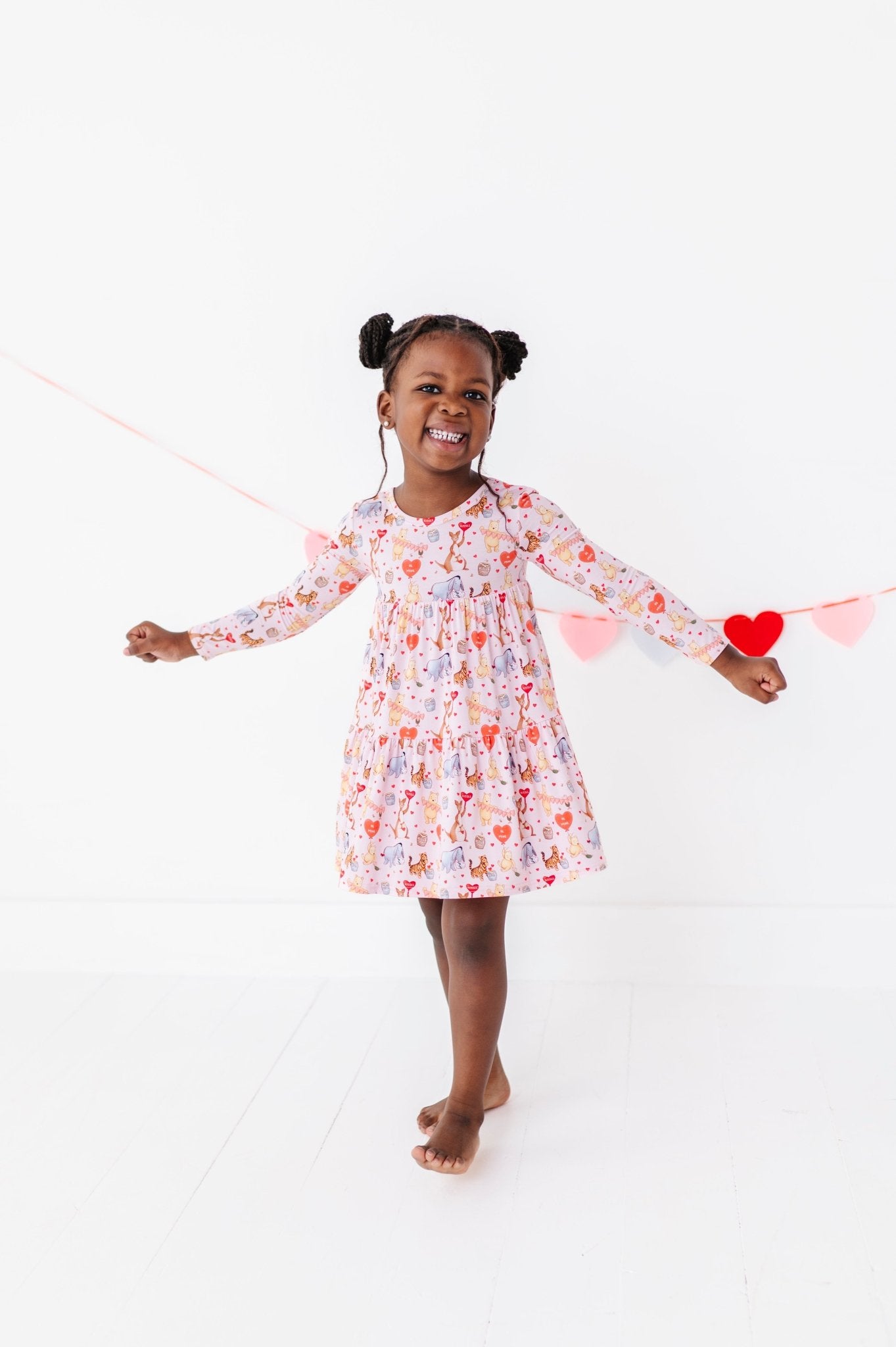 TIERED LONG SLEEVE TWIRL DRESS - 100 ACRES OF KISSES - The Sleepy Sloth