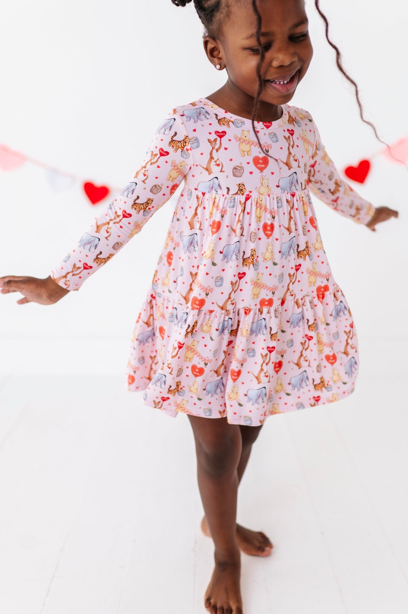 TIERED LONG SLEEVE TWIRL DRESS - 100 ACRES OF KISSES - The Sleepy Sloth