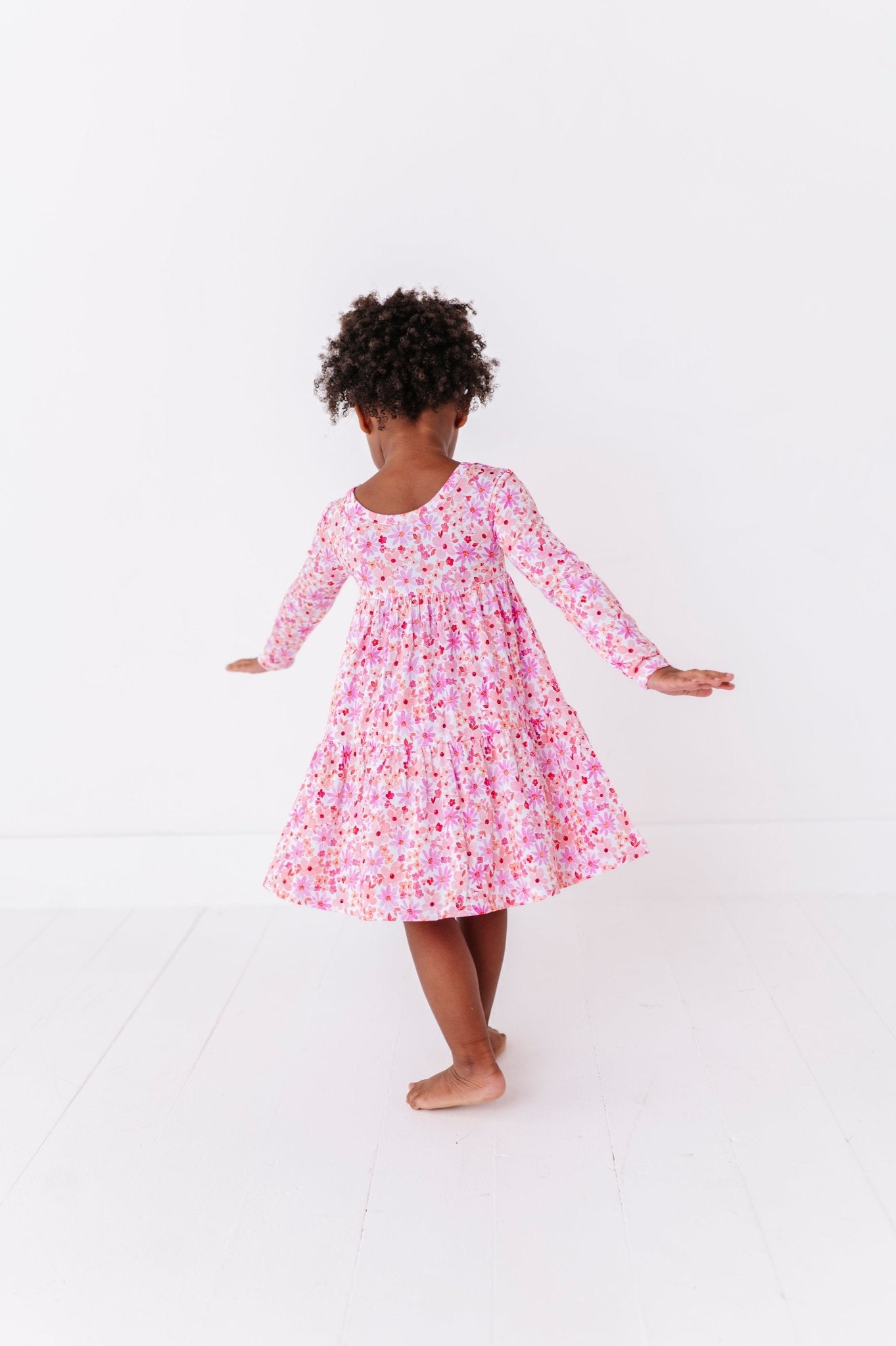 TIERED LONG SLEEVE TWIRL DRESS - BLUSHING BLOOMS - The Sleepy Sloth