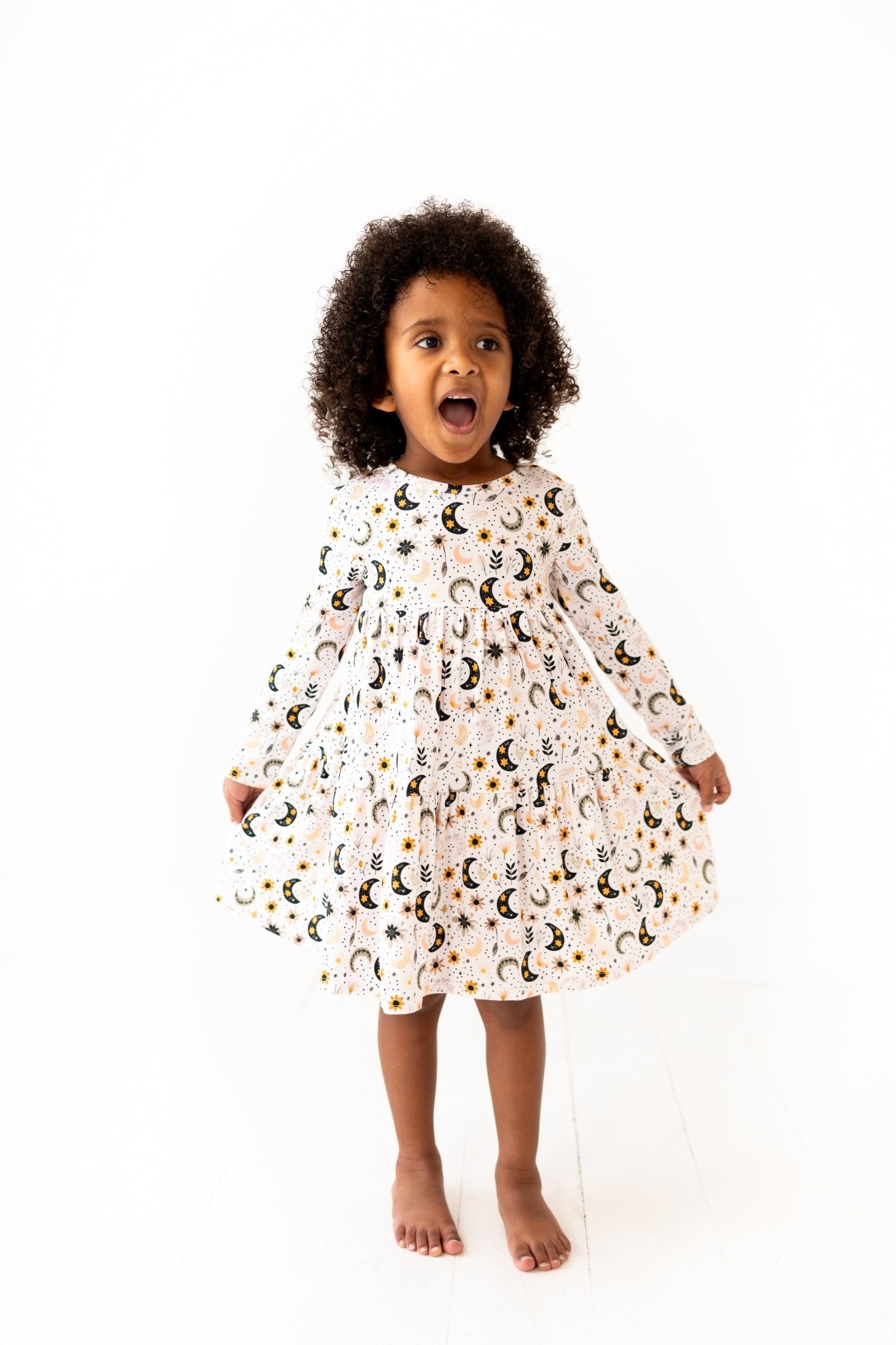 TIERED LONG SLEEVE TWIRL DRESS - LUNAR BLOSSOM - The Sleepy Sloth