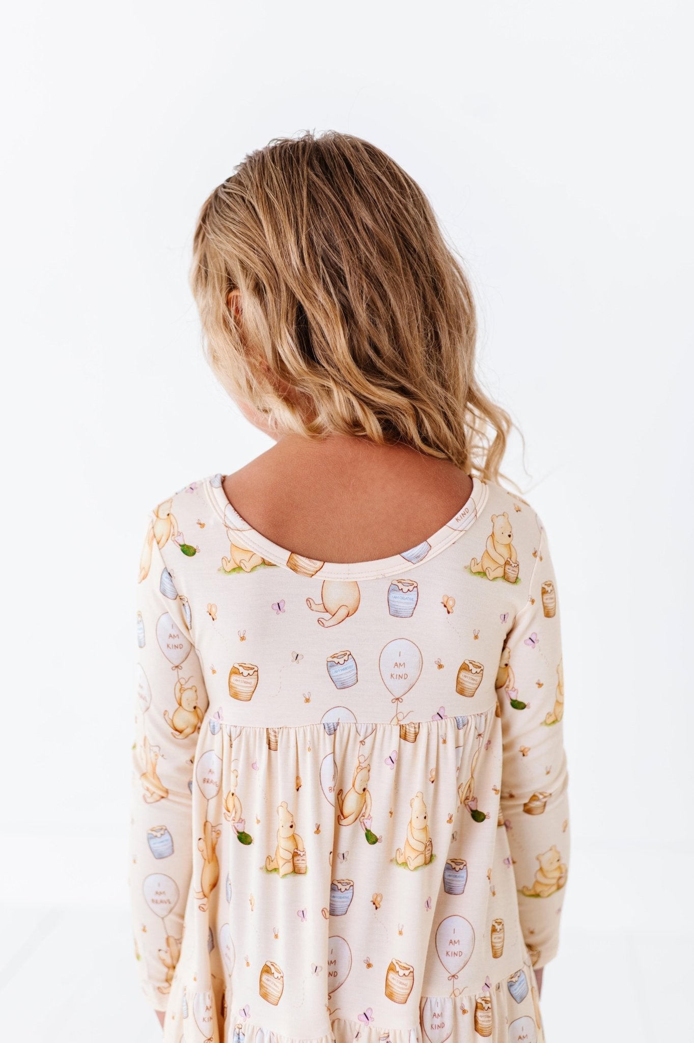 TIERED LONG SLEEVE TWIRLIE DRESS - 100 ACRES OF KINDNESS - The Sleepy Sloth