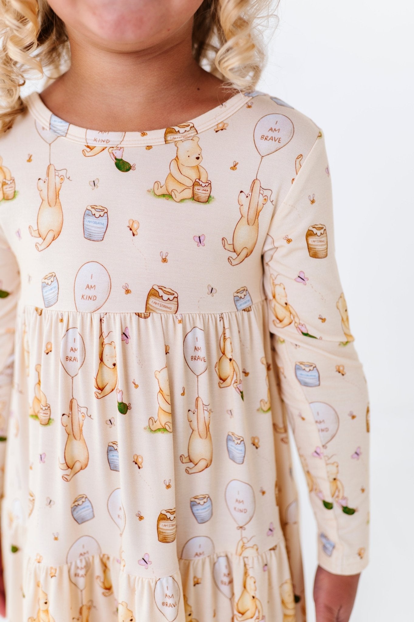 TIERED LONG SLEEVE TWIRLIE DRESS - 100 ACRES OF KINDNESS - The Sleepy Sloth