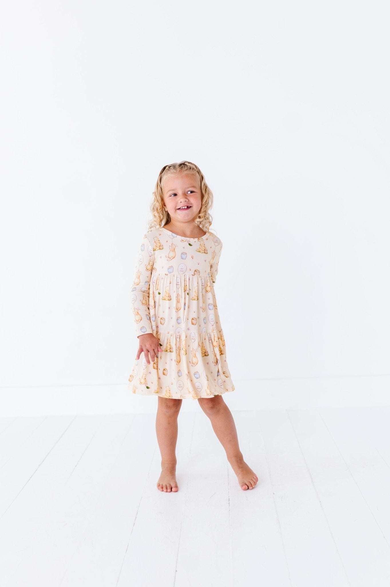 TIERED LONG SLEEVE TWIRLIE DRESS - 100 ACRES OF KINDNESS - The Sleepy Sloth