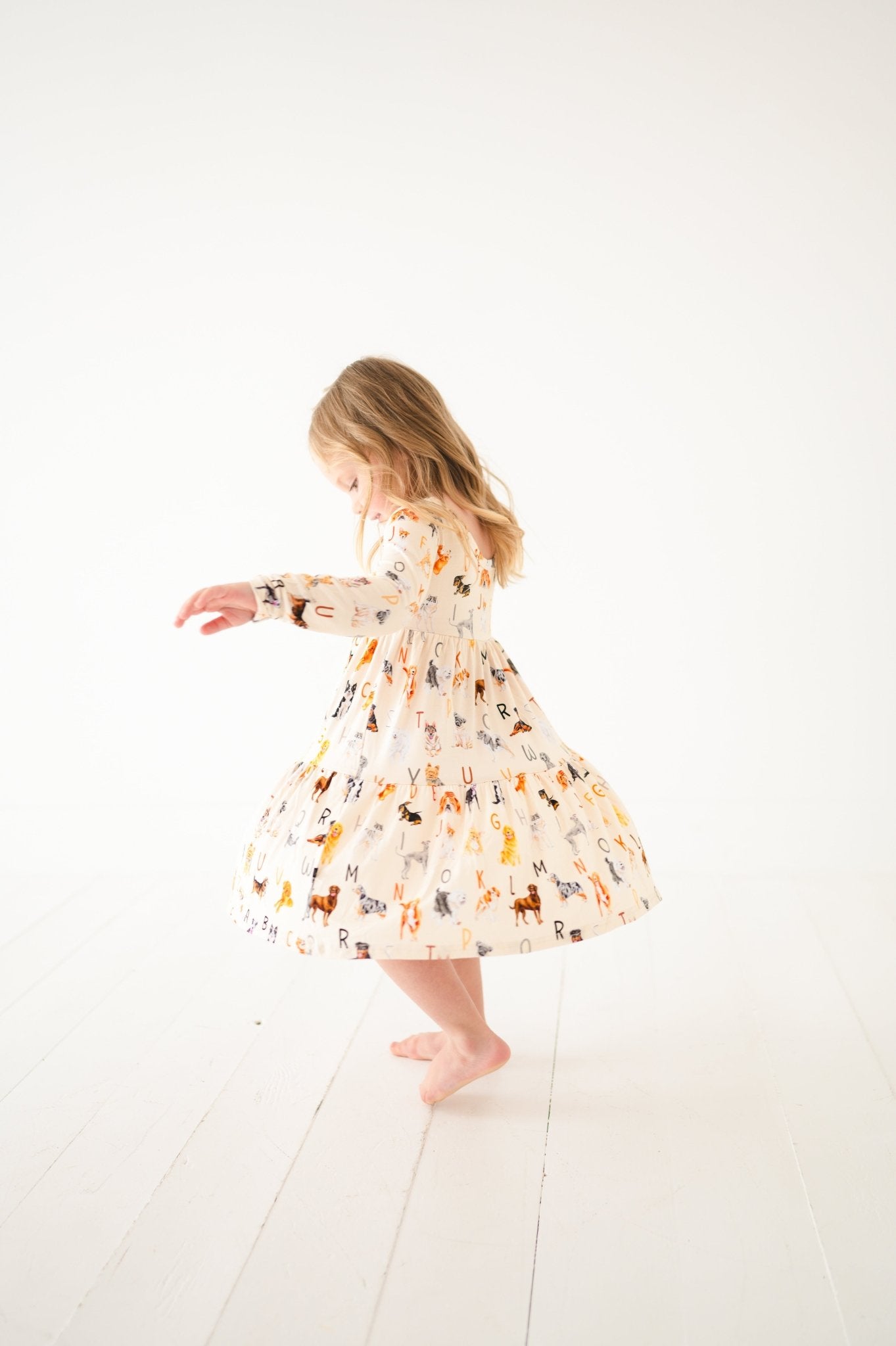 TIERED LONG SLEEVE TWIRLIE DRESS - D IS FOR DOG - The Sleepy Sloth