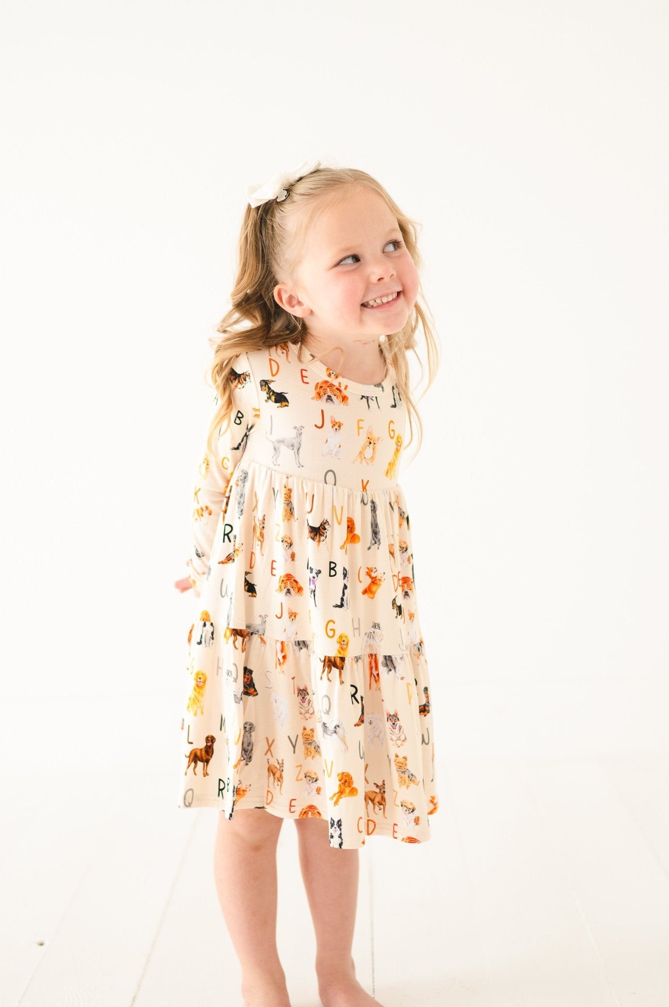 TIERED LONG SLEEVE TWIRLIE DRESS - D IS FOR DOG - The Sleepy Sloth