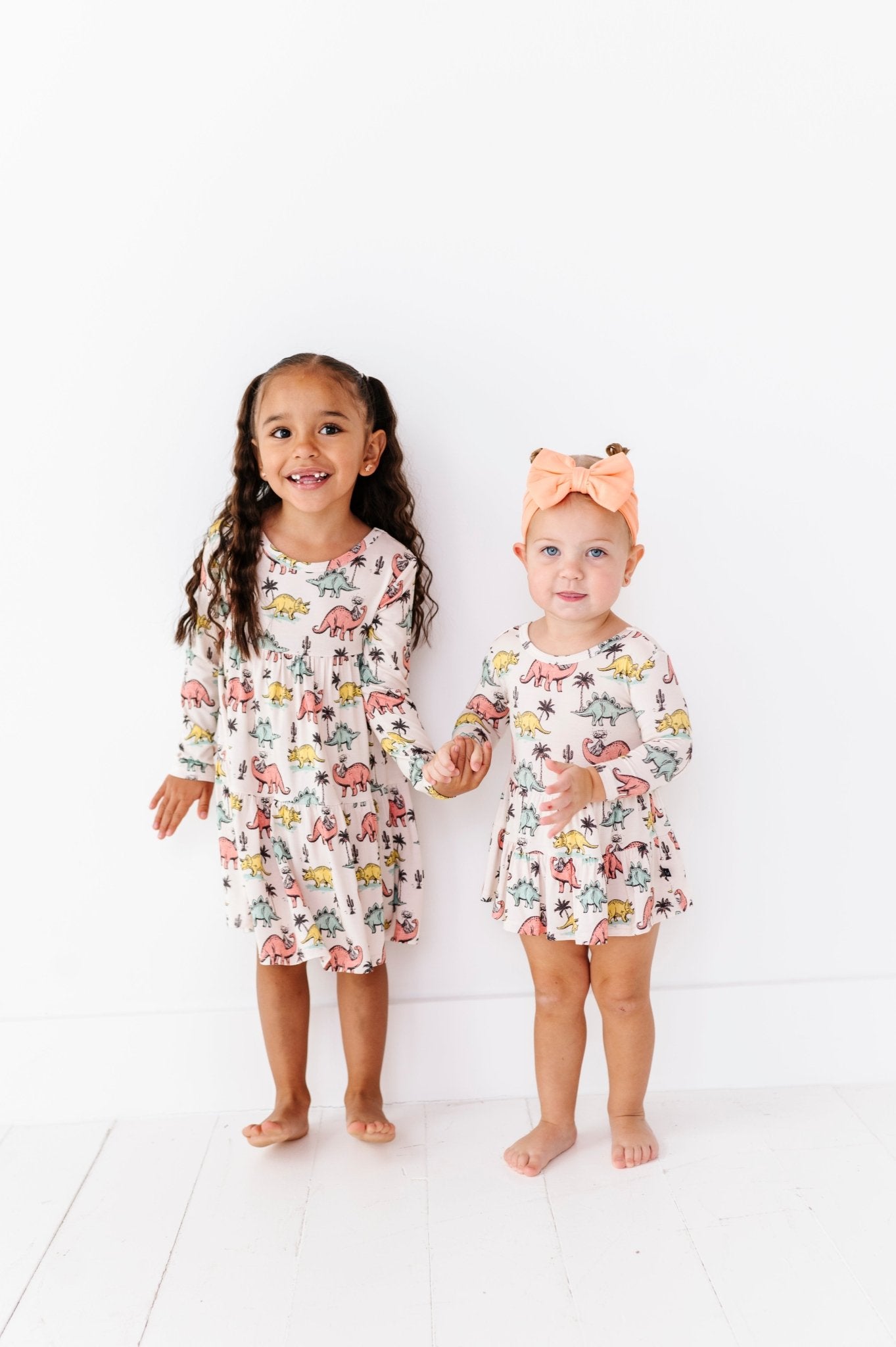 TIERED LONG SLEEVE TWIRLIE DRESS - PREHISTORIC - The Sleepy Sloth