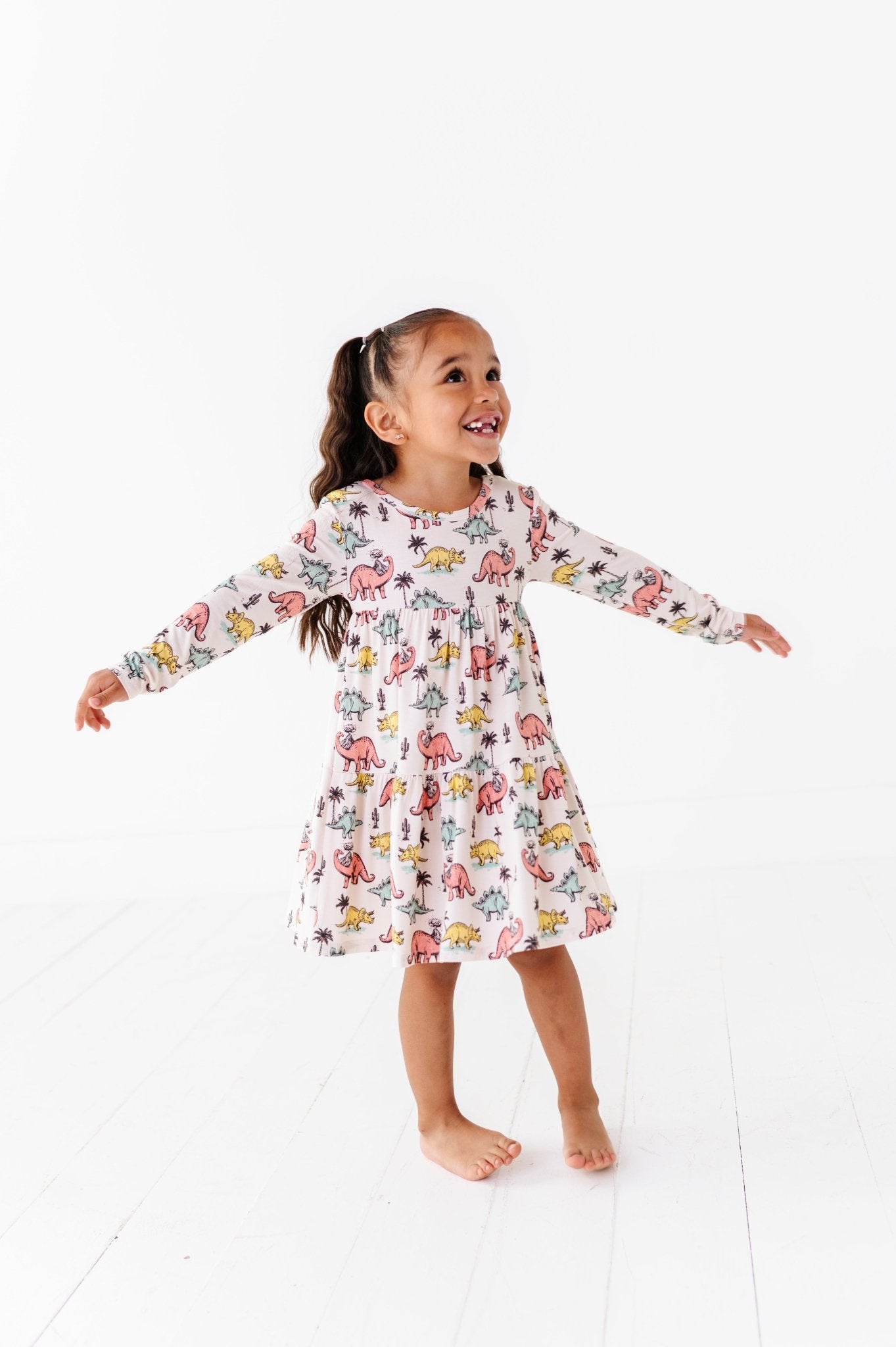 TIERED LONG SLEEVE TWIRLIE DRESS - PREHISTORIC - The Sleepy Sloth